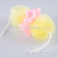 Exfoliating shaped bath sponge shower puff